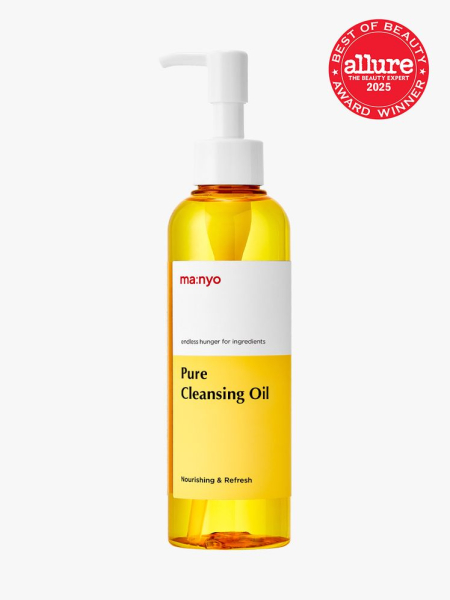 ma:nyo Pure Cleansing Oil orange bottle of facial cleansing oil with white pump on light gray background with red Allure Best of Beauty seal in the top right corner